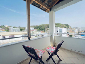 Sunrise Sea View - Spacious Balcony, Full Kitchen, Wifi, AC